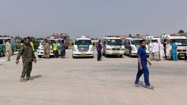 Ambulances prepare to receive victims of an earthquake