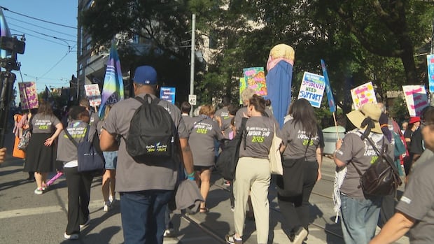 Back-to-work orders, wages, U.S. tariffs at centre of Toronto's Labour Day rallies | CBC News