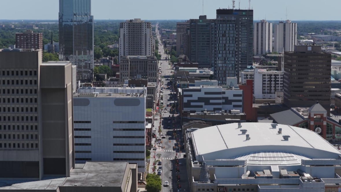 A drone shot shows the streets of downtown London, Ontario.