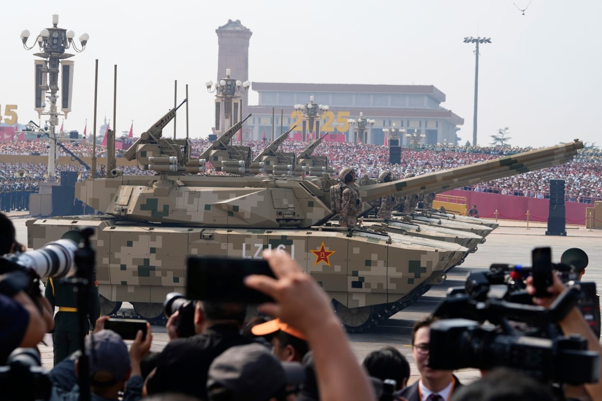 Tanks spin and people take pictures.