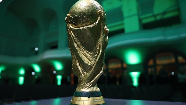 A trophy on a pedestal.