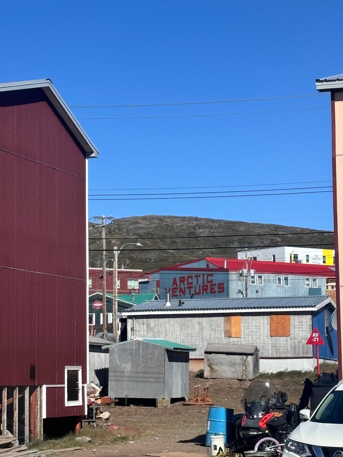 Buildings in Iqaluit, Nunavut. One of the buildings has a sign that says Arctic Companies.