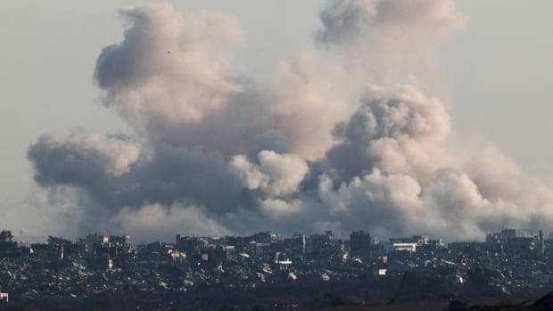 a plume of smoke over a city