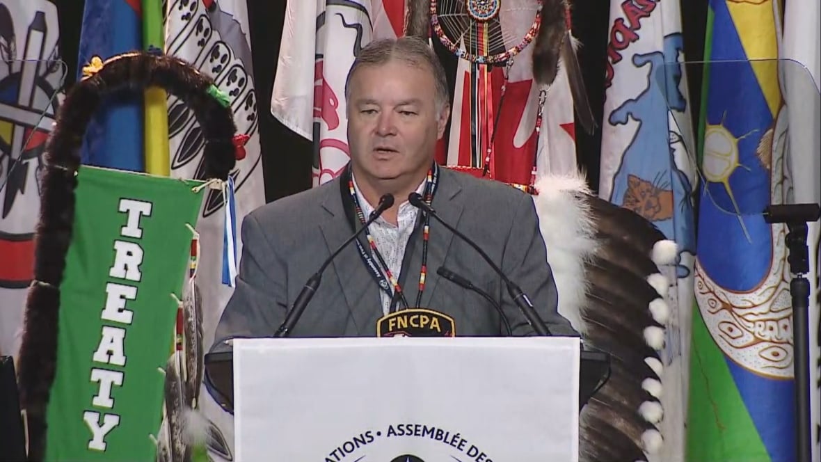 Man at podium speaking