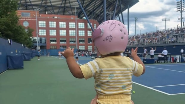 Viral Sensation Stella, Baby with Signed Helmet, Steals Hearts at U.S. Open