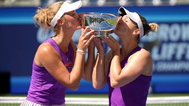 Two female tennis players.