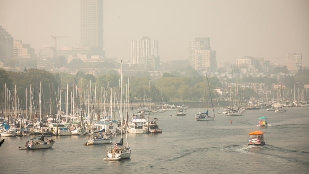 Smoke clouds the boats in False Creek in Vancouver B.C.