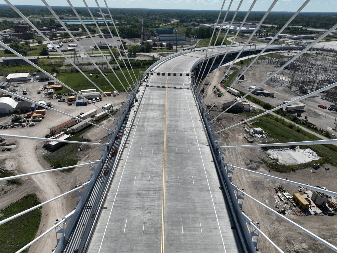 Freshly painted lines on the Gordie Howe bridge are shown from an aerial view.