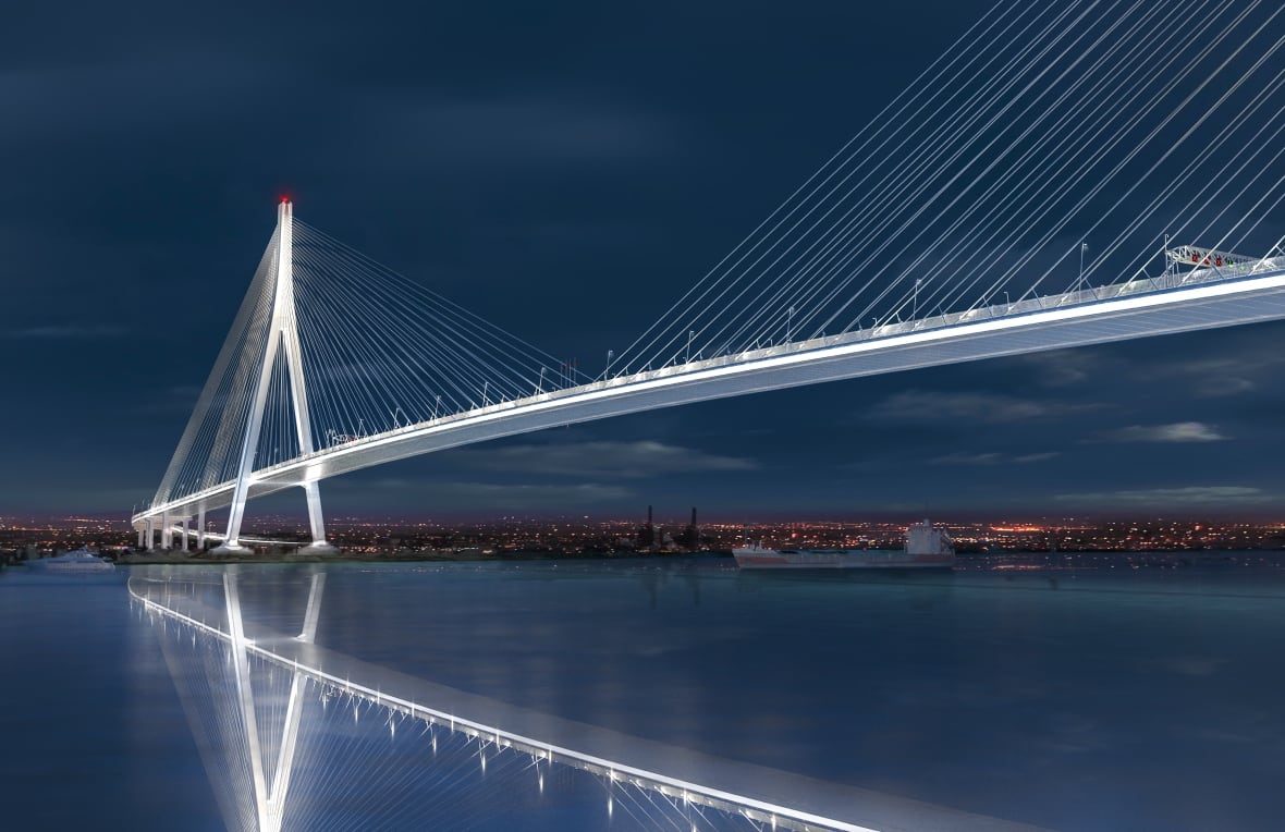 A nighttime rendering of the Gordie Howe bridge lit up from the Detroit River.