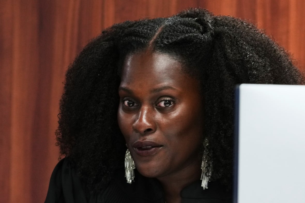 Local court judge Christine Simons speaks while rejecting criminal cases against 15 people accused of falsely acting as voters for President Donald Trump in the 2020 elections on Tuesday, September 9, 2025 in Lansing, Michigan.