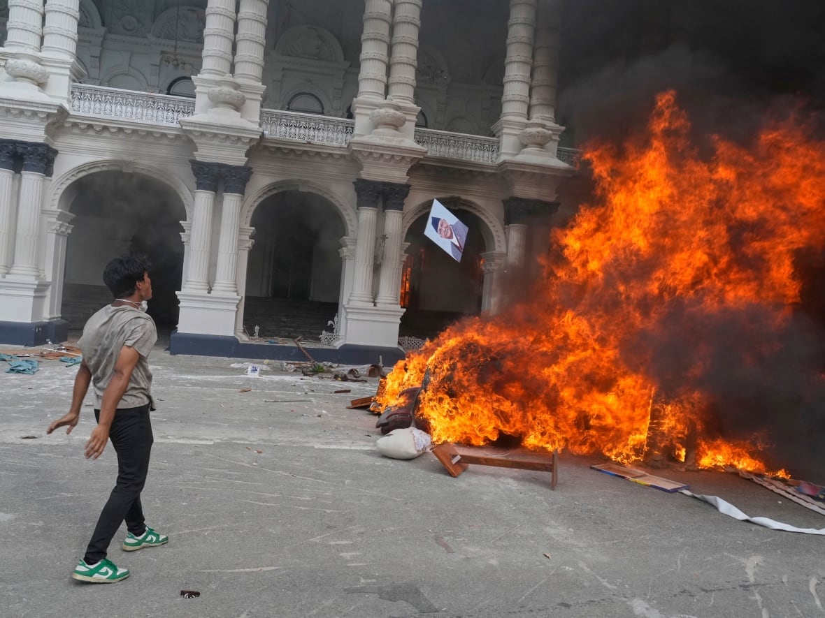 Nepal protests grow more violent as protesters torch government buildings,  attack politicians | CBC News
