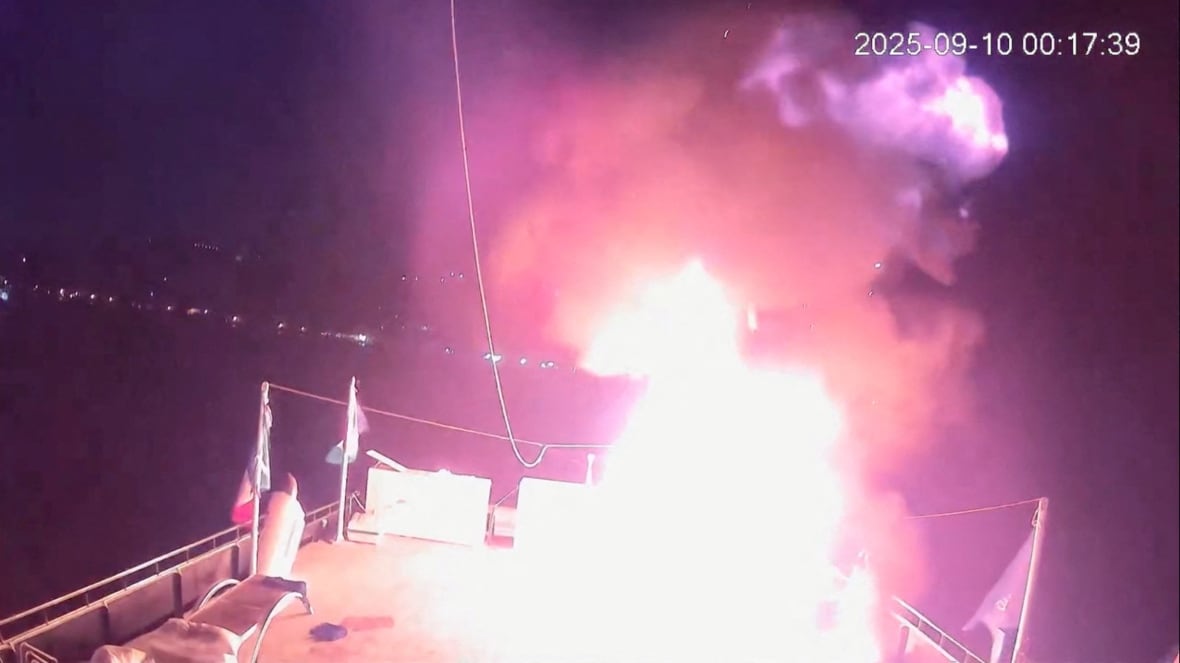 CCTV shots show a fire on the roof of a drawn boat