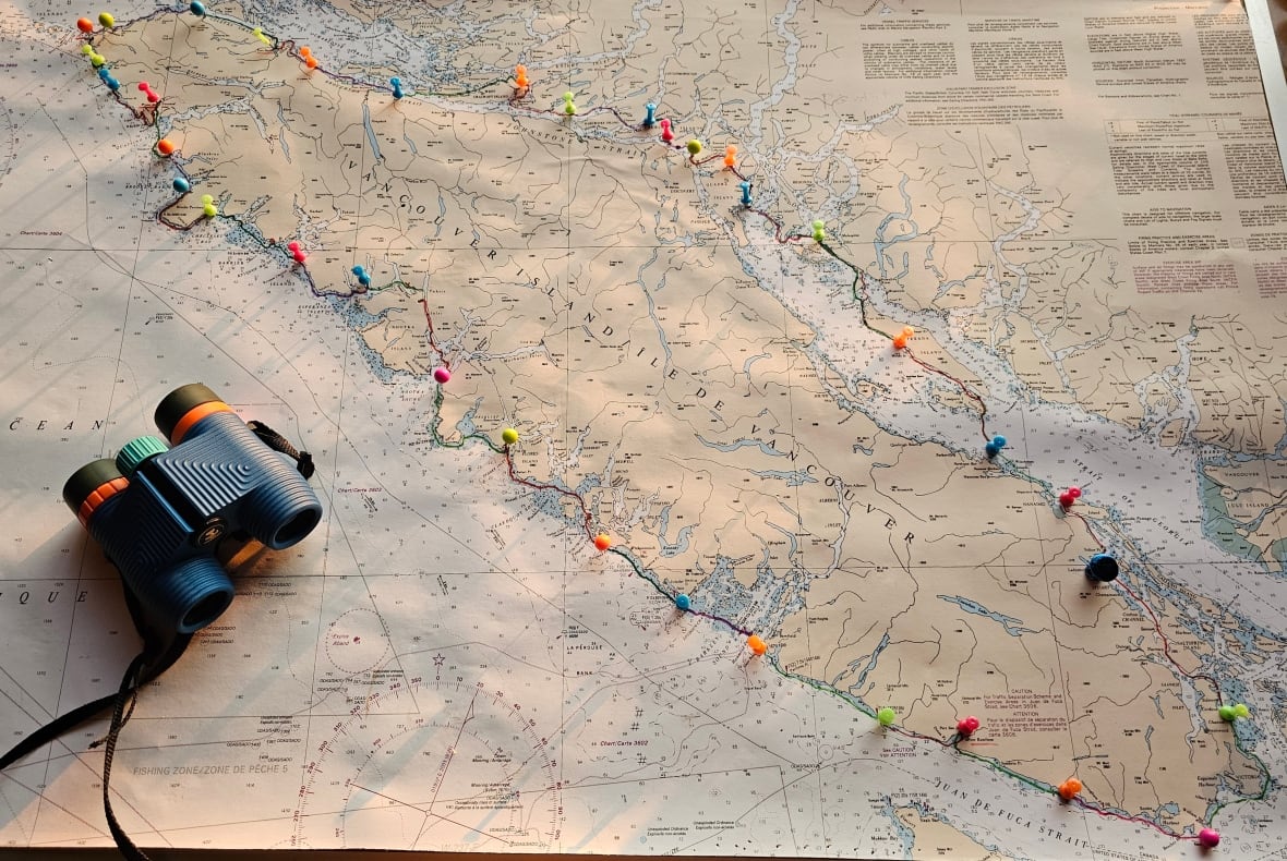 A map of Vancouver Island and a pair of binoculars