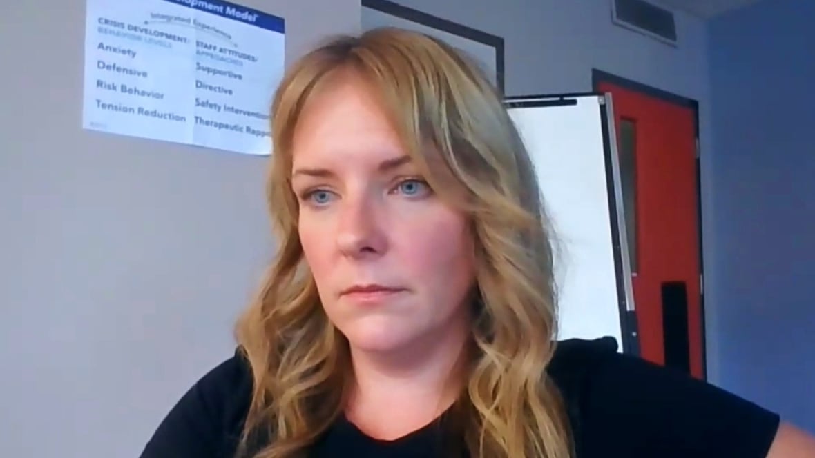 A woman pictured in a screen grab of a video call.