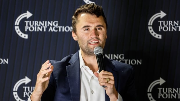 Charlie Kirk speaks during a town hall meeting