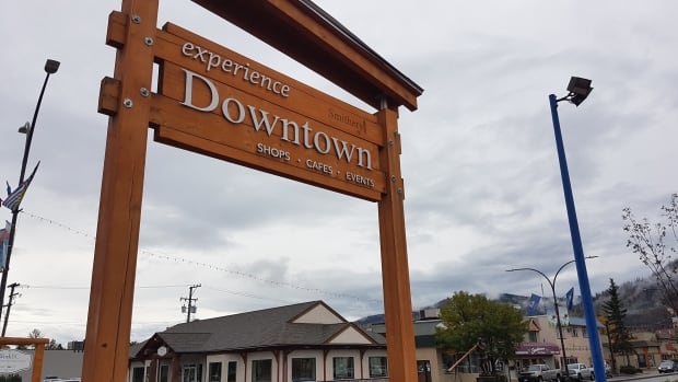 A sign that says experience downtown in Smithers, B.C. 