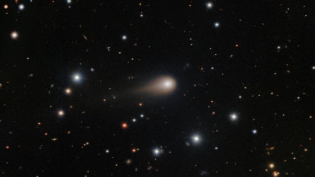 An image of a faint fuzzy object among stars.