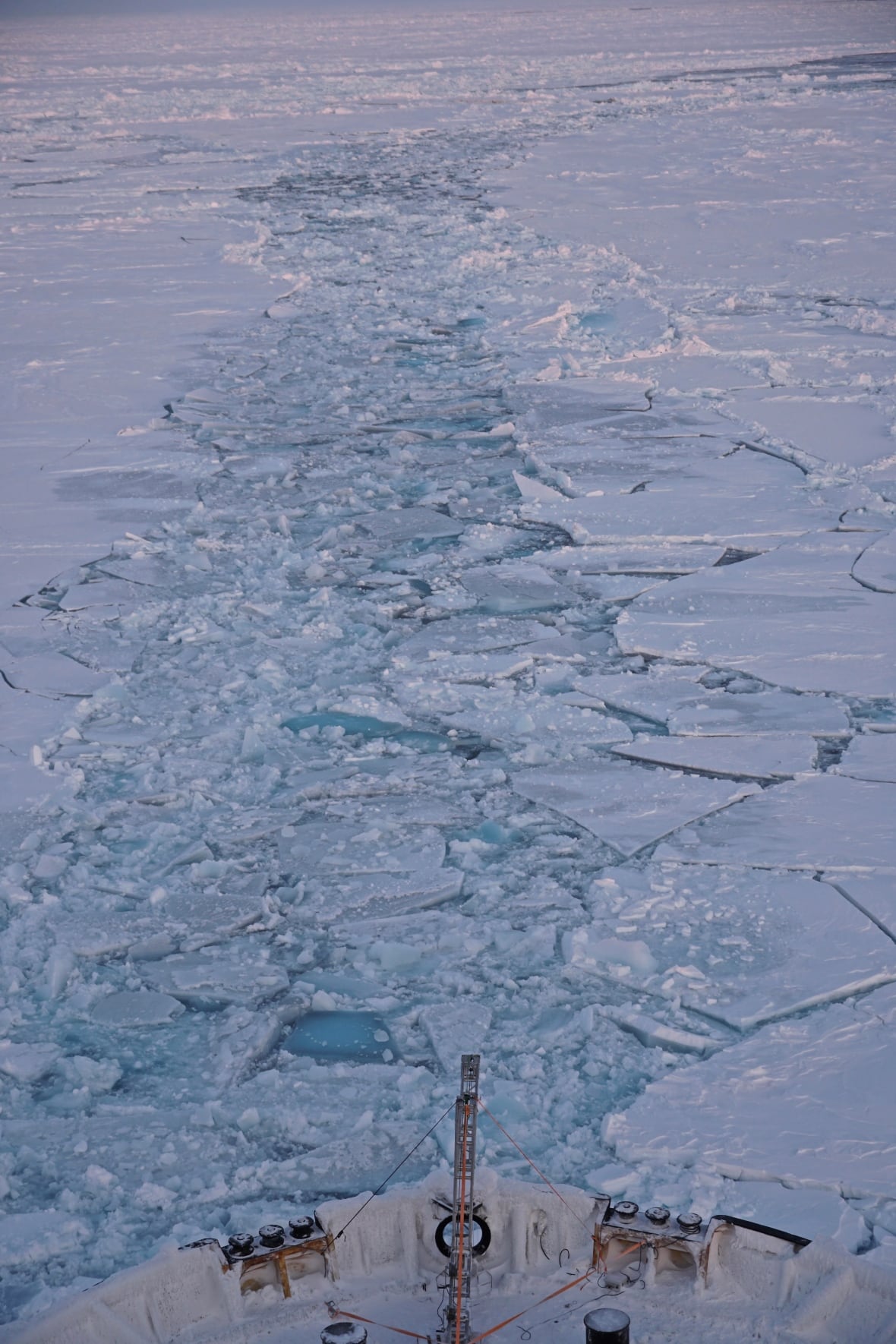 Pictures of a ship that passes over the sea ice.