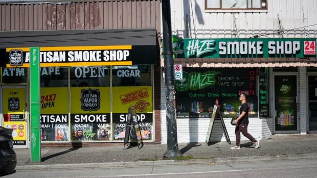 Two vapes shops side by side