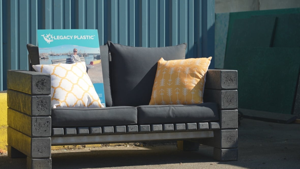 A plastic patio sofa.
