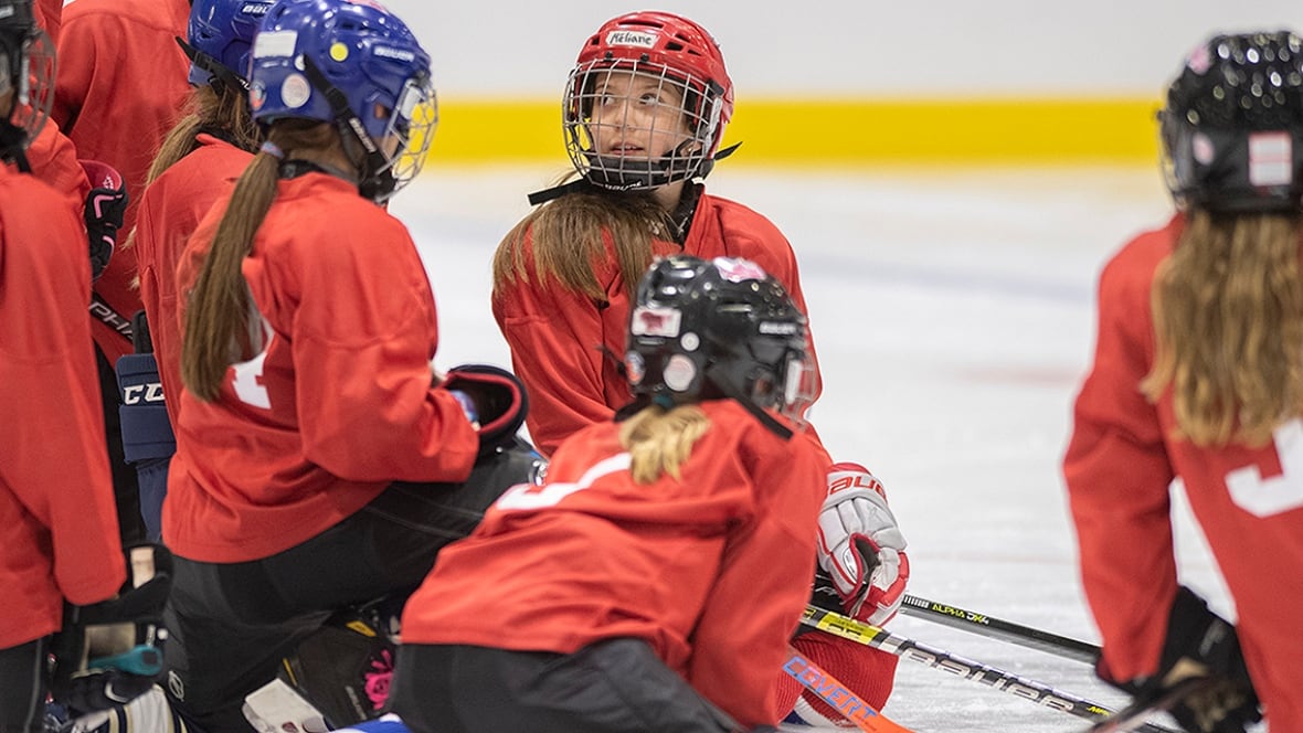 Players with the Canadiennes de Montreal hockey team are shown during a practice in Montreal on November 5, 2021.