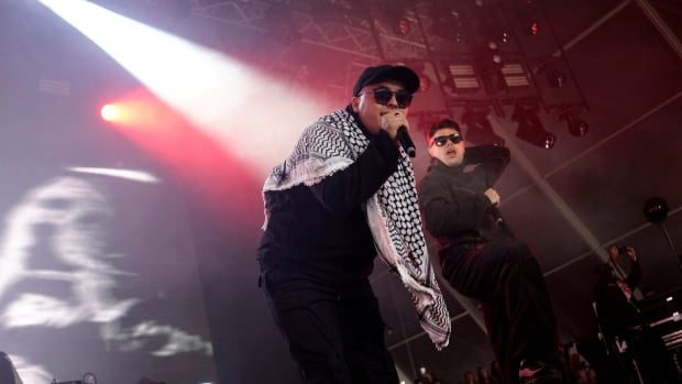 Men on stage screaming into microphones.