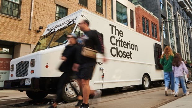 A bus is shown with the words The Criterion Closet on the side. 