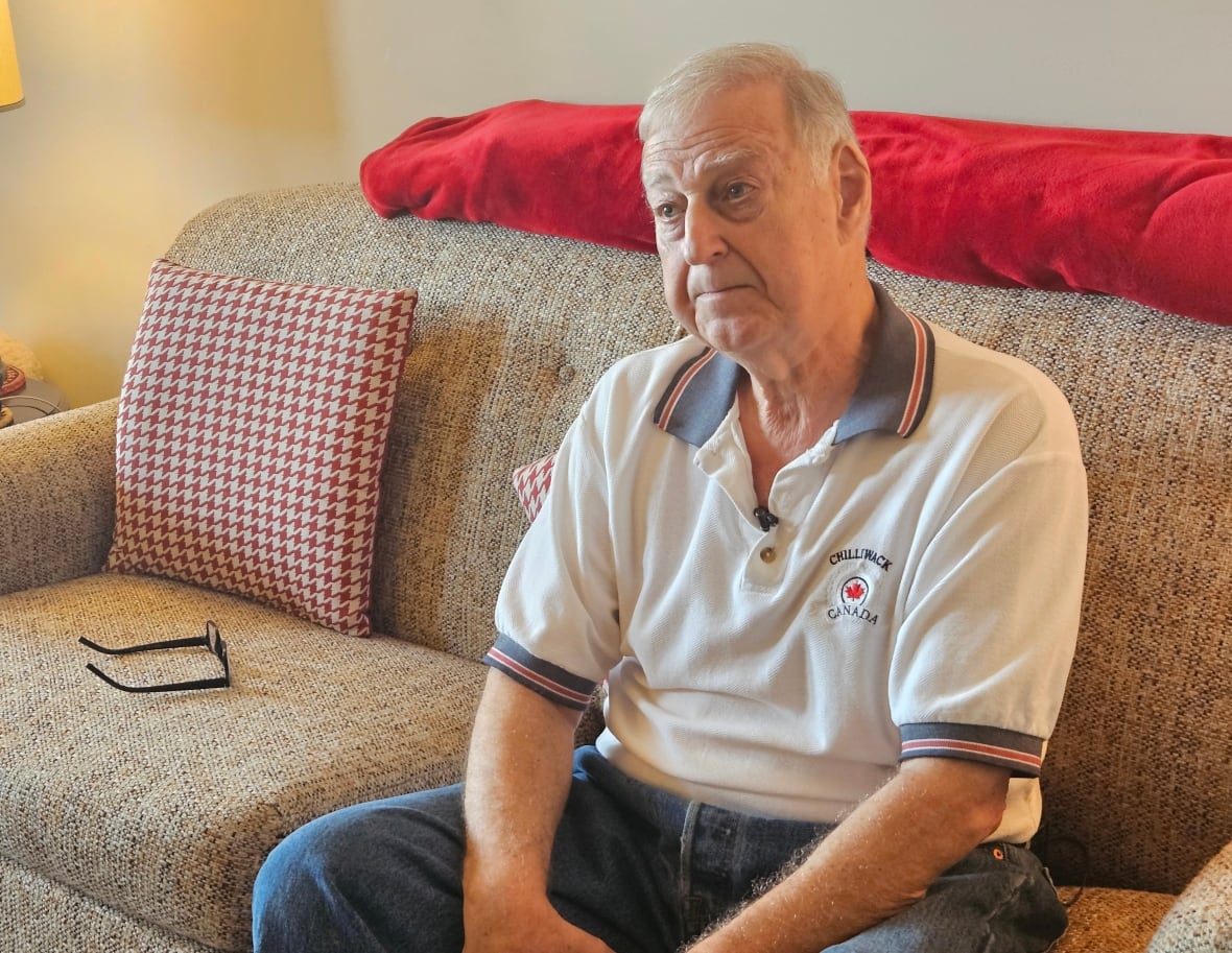 An older man on a couch
