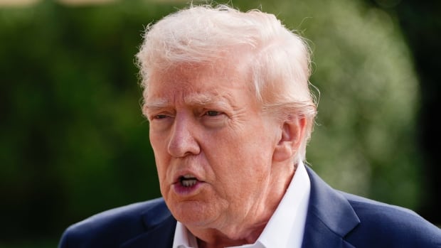 A person is seen speaking.