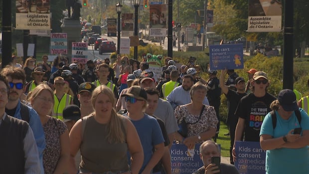 Protests clash at Queen's Park over gender-affirming care for children | CBC News
