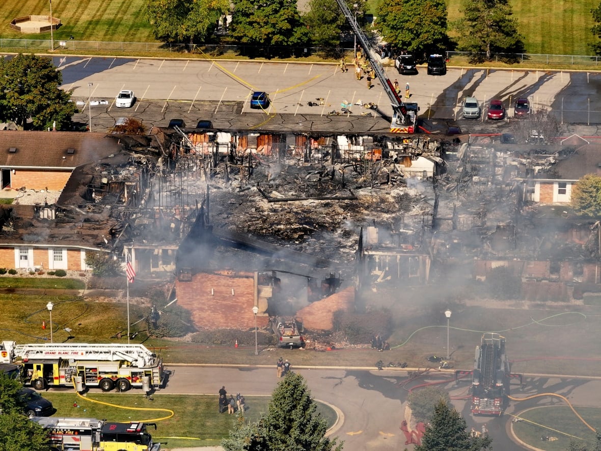 Emergency crews respond to shooting and shooting at the Church of Jesus Christ for the last days, in Grand Blanc, Michigan, September 28, 2025.
