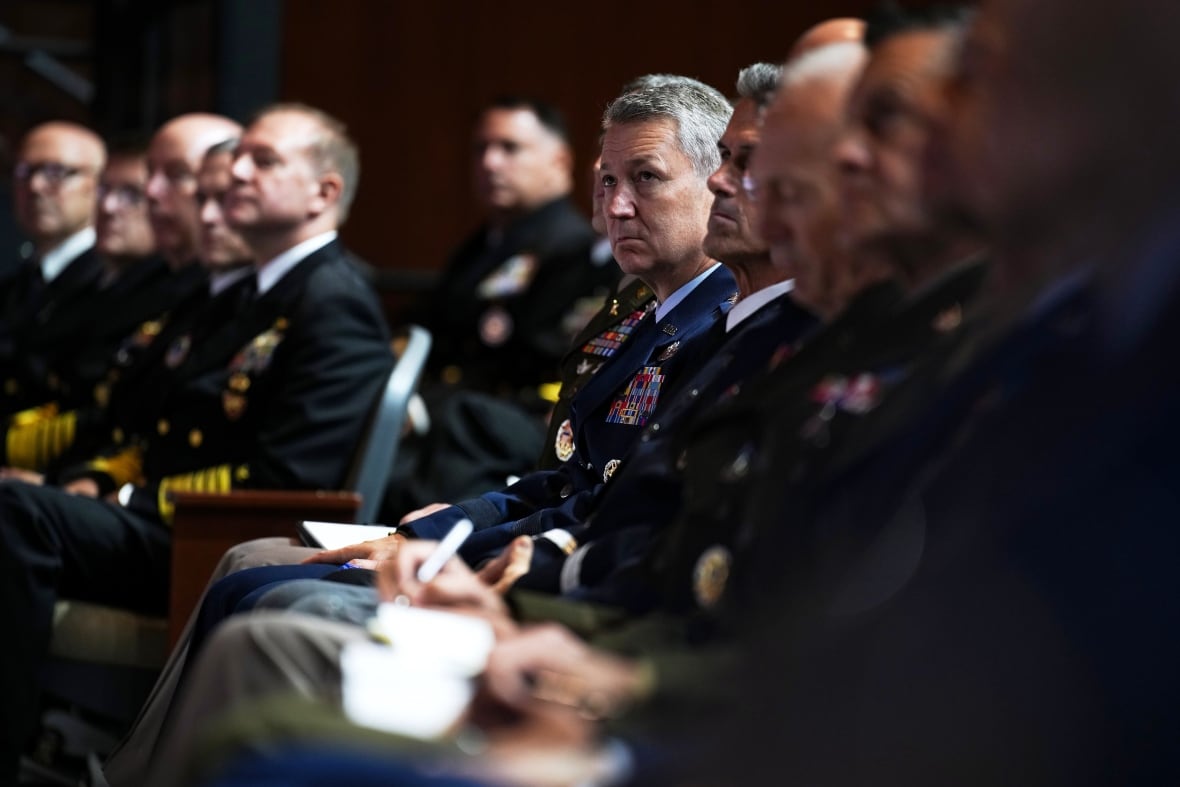 Mills in the military uniforms live in the audience