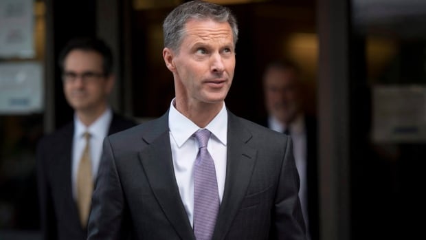 Nigel Wright, former Chief of Staff to Prime Minister Stephen Harper, leaves the courthouse in Ottawa following his sixth day of testimony at the trial of former Conservative Senator Mike Duffy on Wednesday, Aug. 19, 2015.