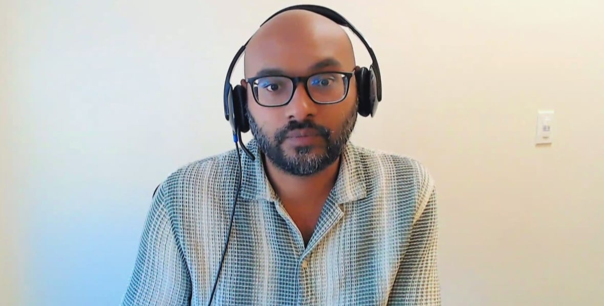 Man sitting with headphones on