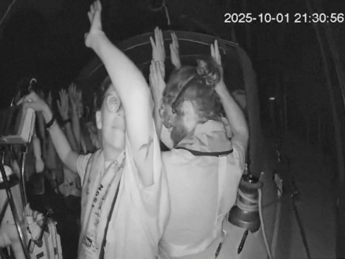 Black and white image loved weapons raised