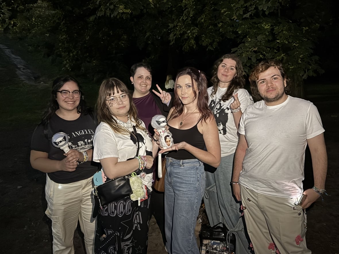 P1Harmony fans show up to greet the band. Bryce Guinta (far right) was invited to perform a dance with the group.