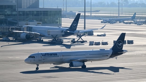An aircraft taxis at an airport.