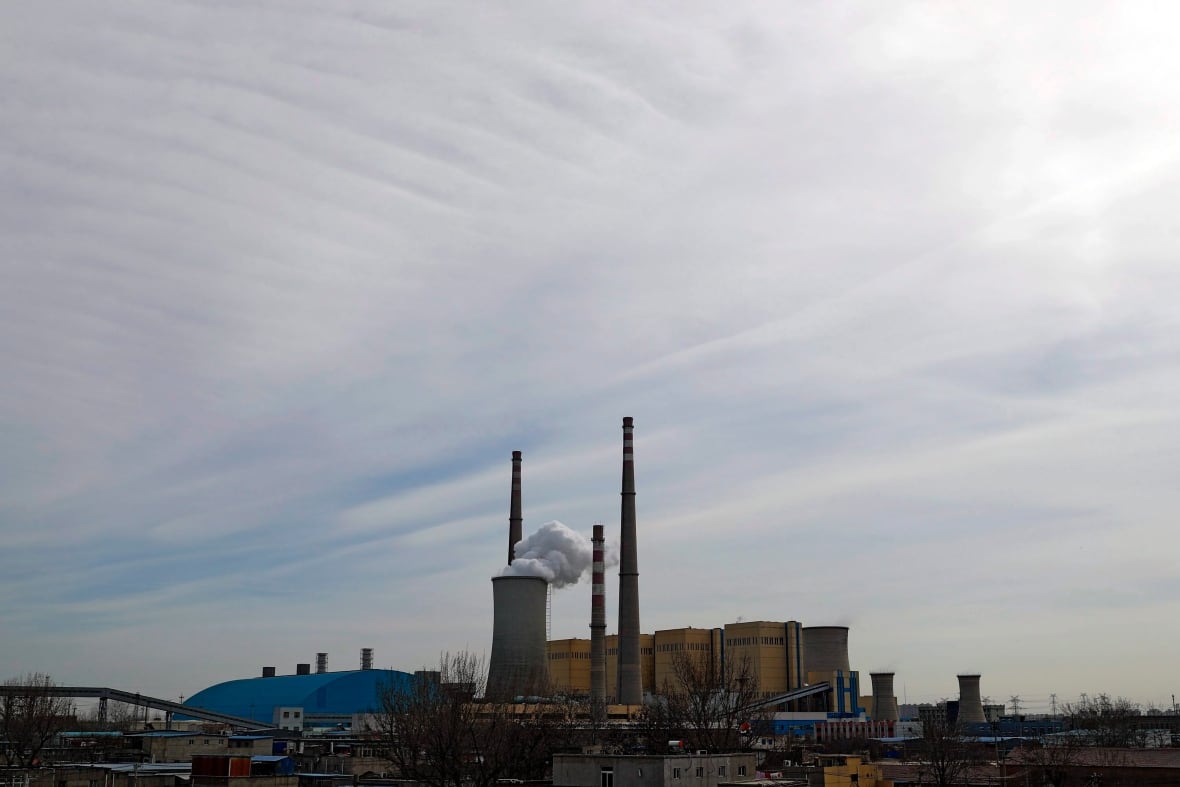 File - In this archive photo of February 28, 2017, white smoke and steam escape from the power plant of the China Huaneng group in Beijing, the last coal -fired power plant to close its doors on March 18, 2017, while the Chinese capital is converted to clean energies like thermal energy. The global coal -fired power plant park should start to decrease by 2022, the out -of -service bets exceeding that of new constructions, according to a new report which warns that the decline of this very polluting fuel could not occur quickly enough to achieve international programs to reduce emissions intended to ward off climate change. (Photo AP/Andy Wong, file)