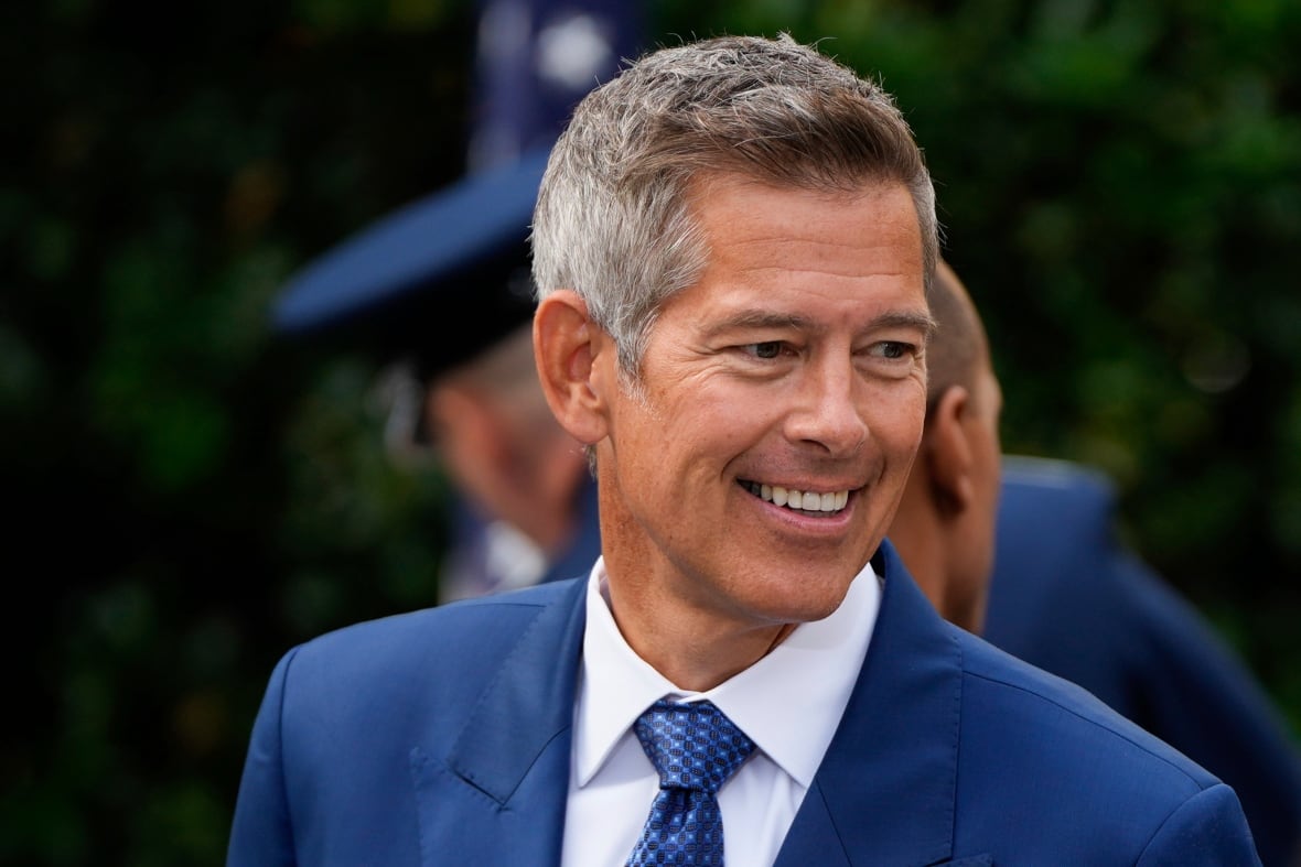 A man in costume smiles