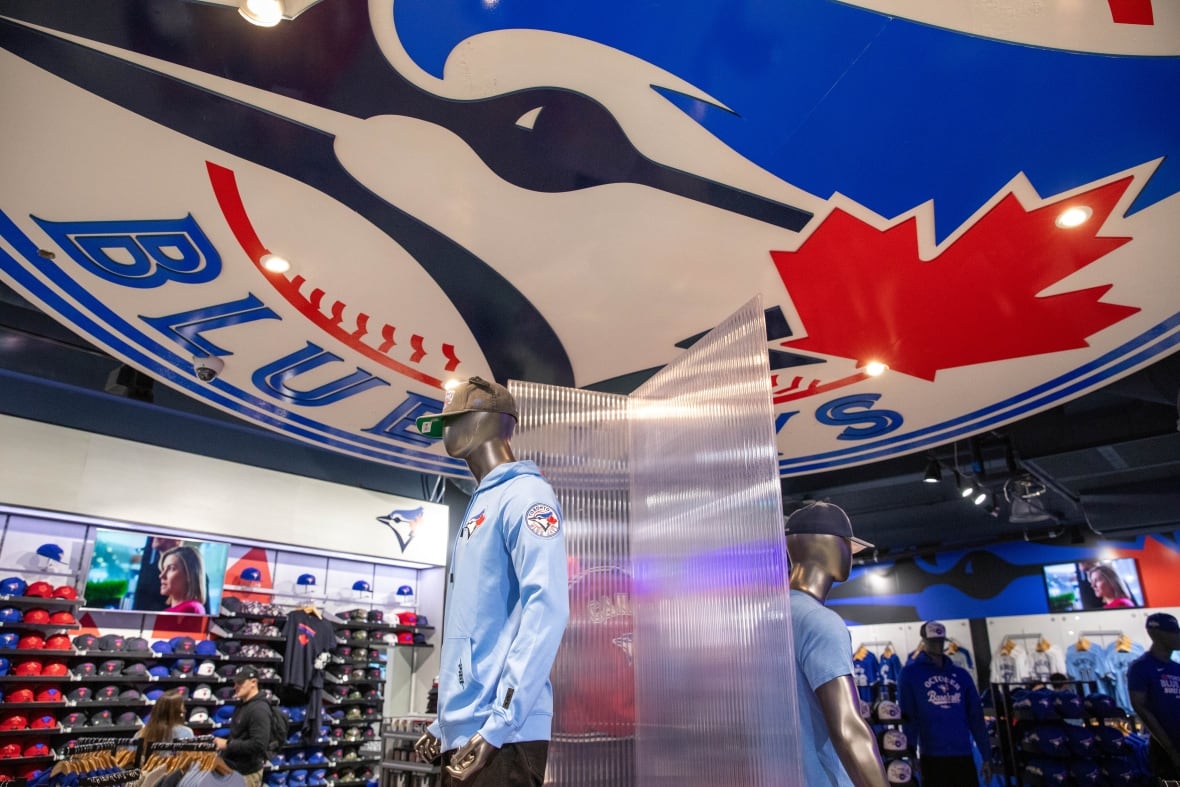 Inside a store selling baseball merchandise.