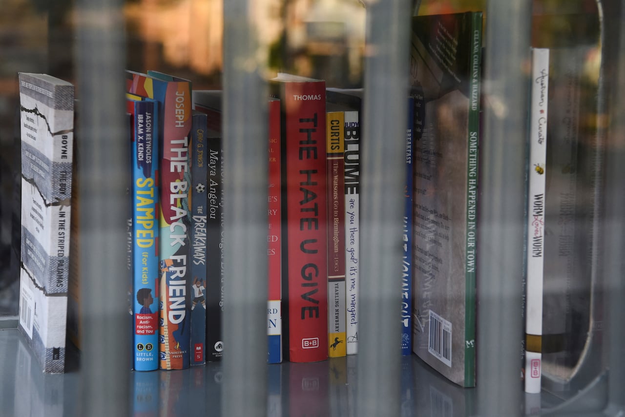 Books set aside, including a black friend, fixed, and hatred is giving