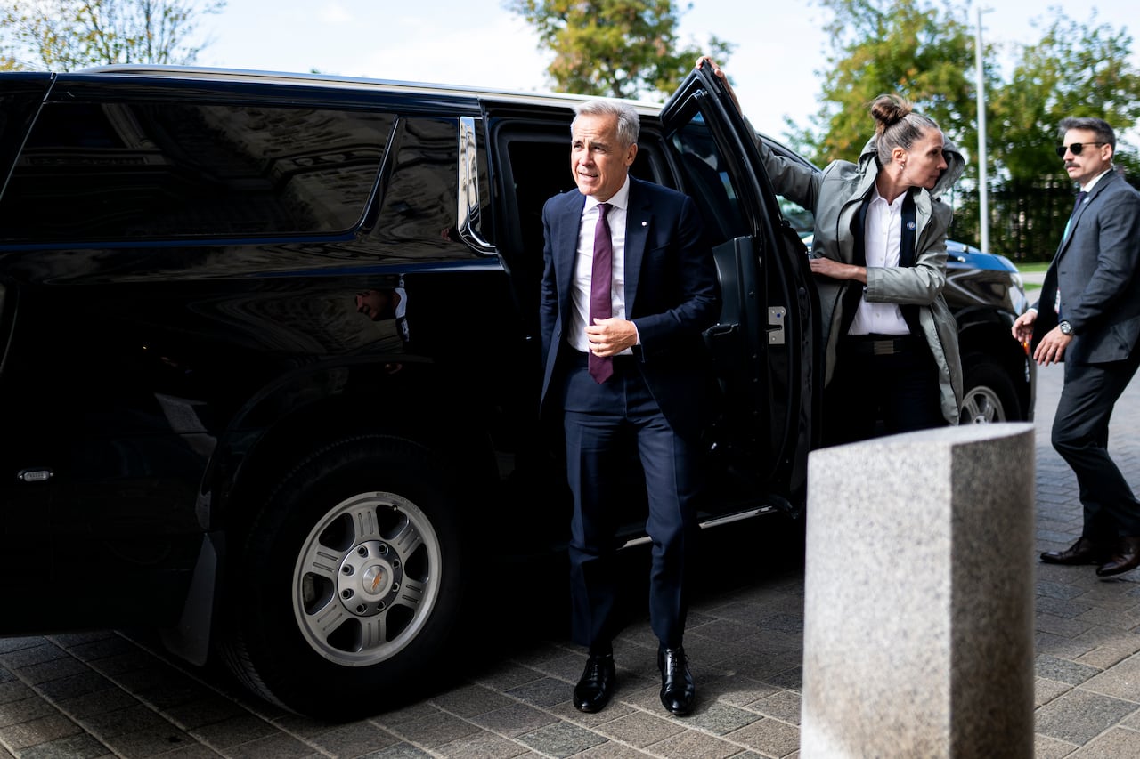 Prime Minister Mark Carney arrives at Parliament Hill in Ottawa, Wednesday, October 8, 2025.
