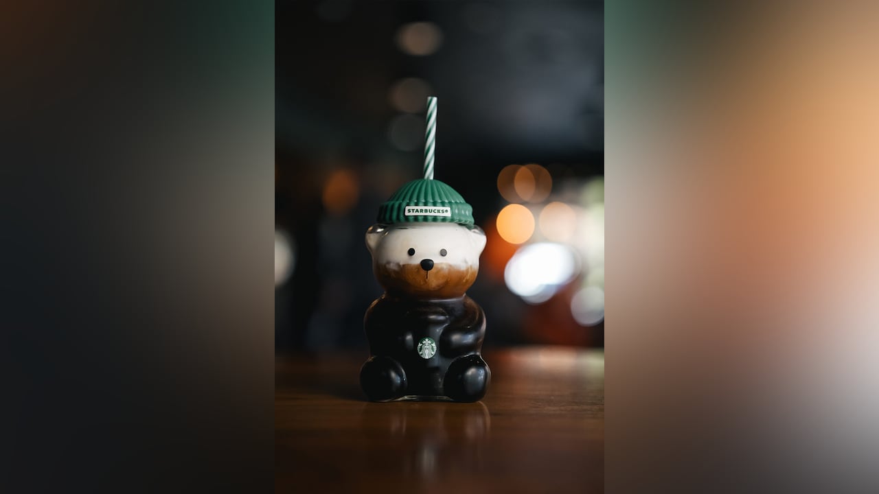 A bear-shaped cupful filled with a brownish liquid