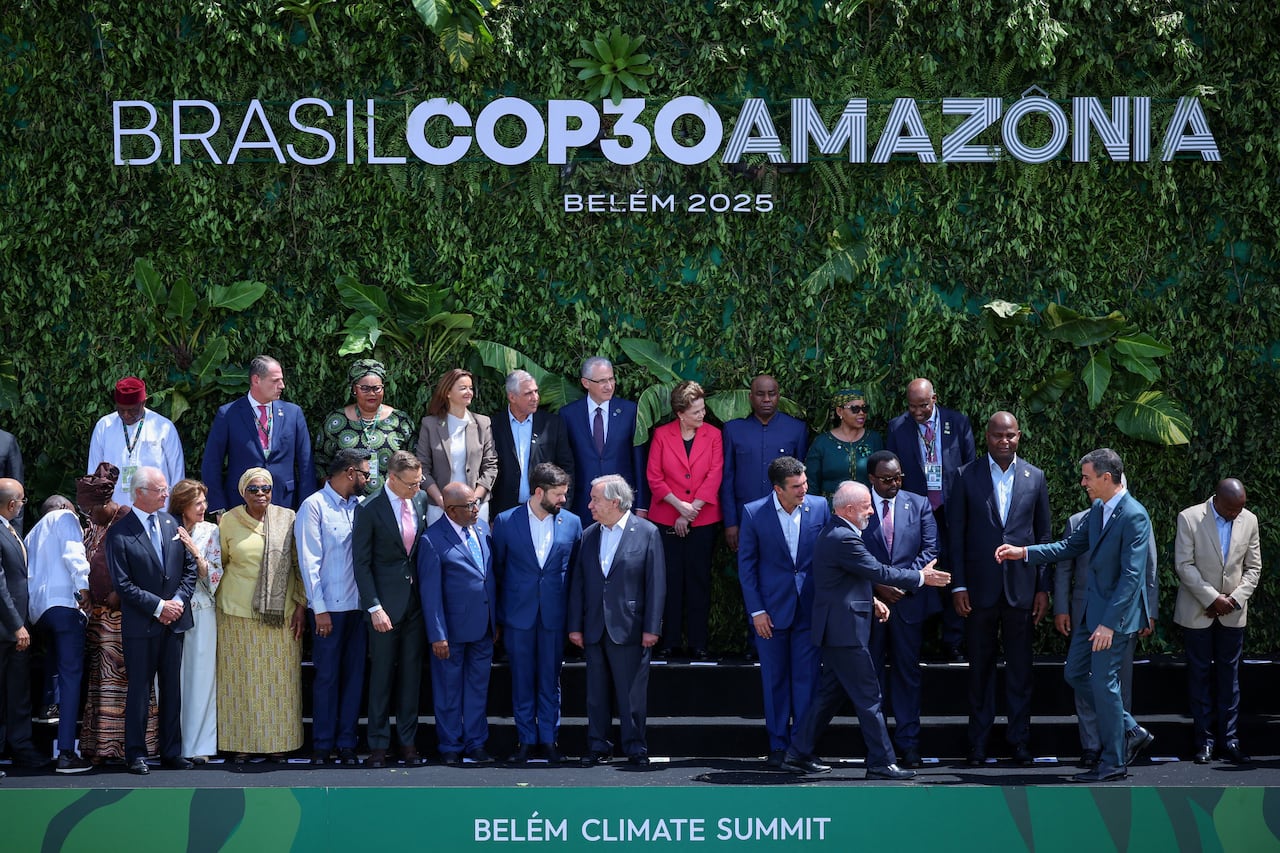 Leaders stand side-by-side at the climate summit in Belém, Brazil