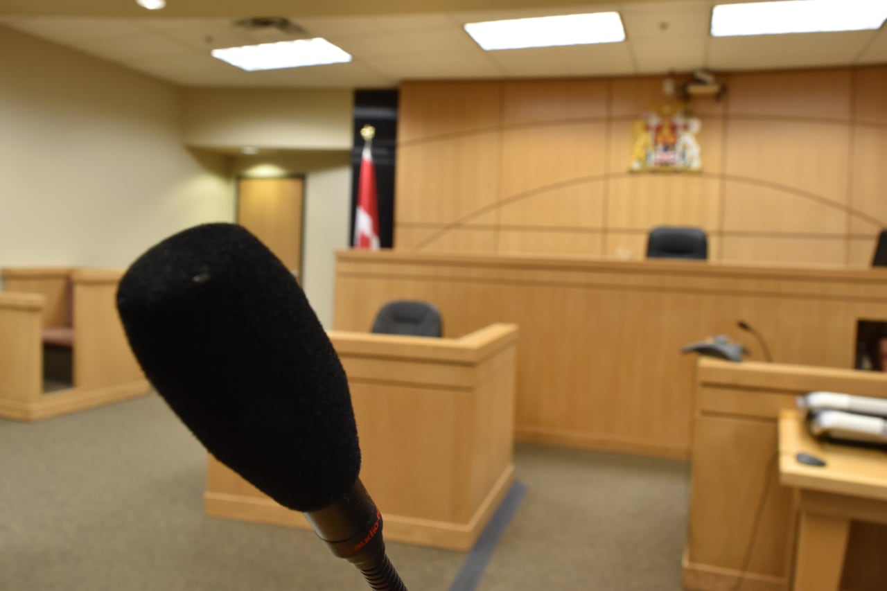 Stock photo from the Nunavut Court of Justice A microphone in a witness box in a courtroom
