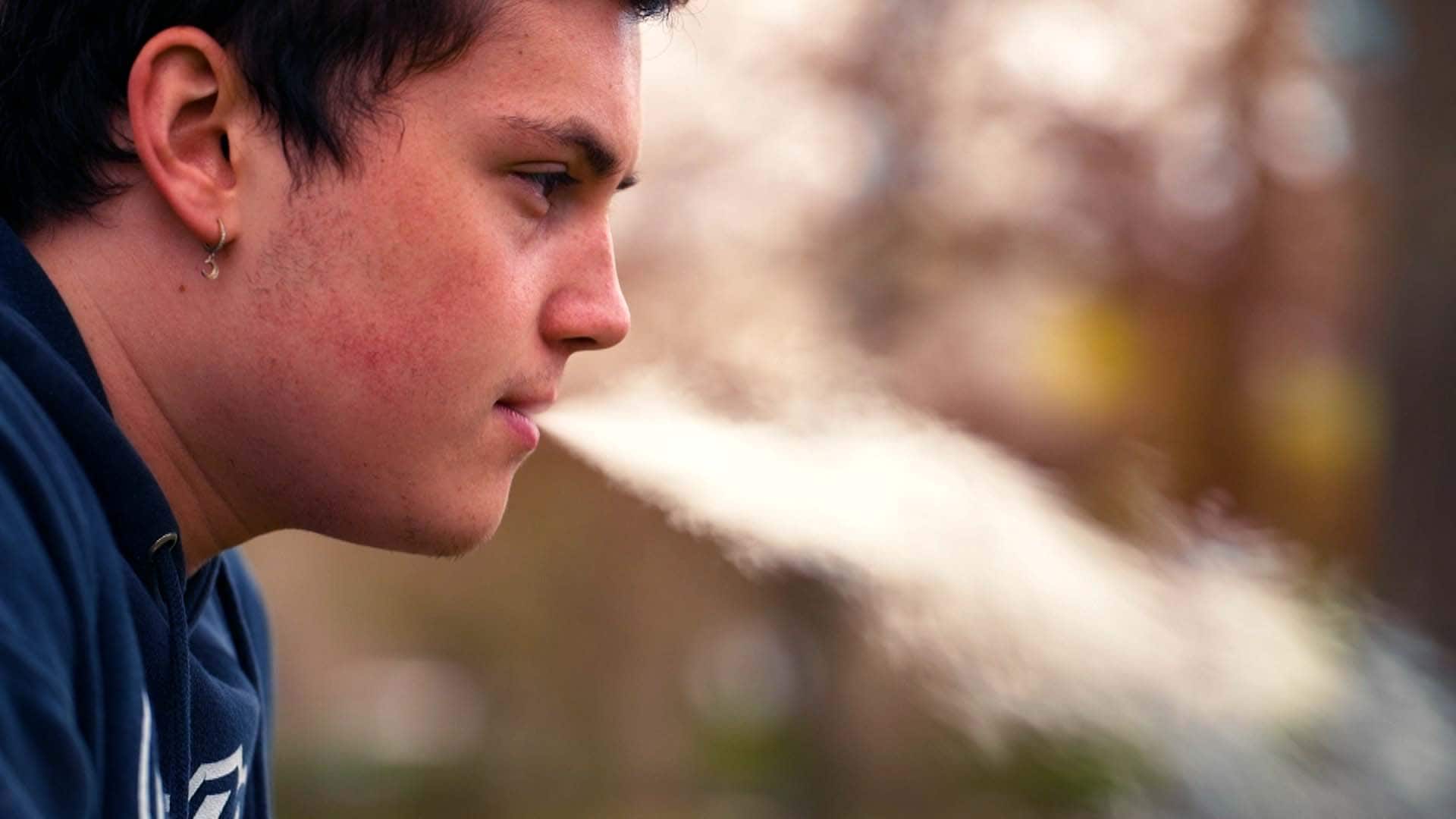pre teen smoking cigarette 