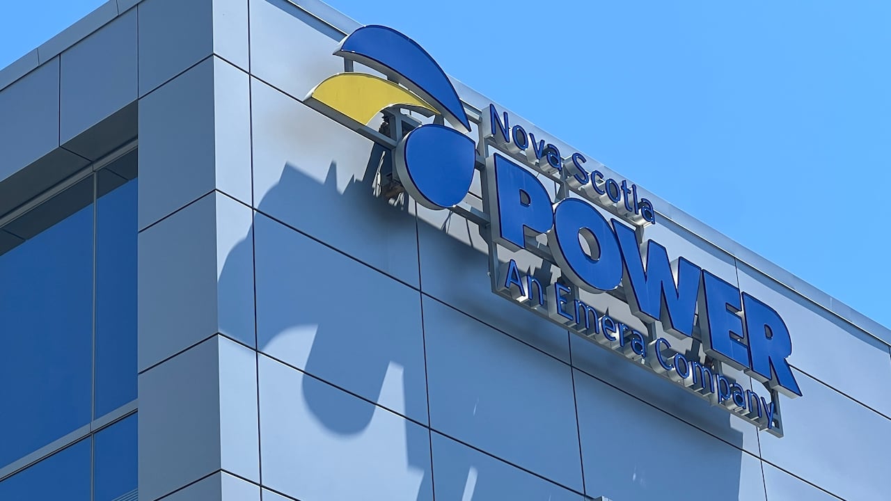A glass building with a Nova Scotia Power sign on top
