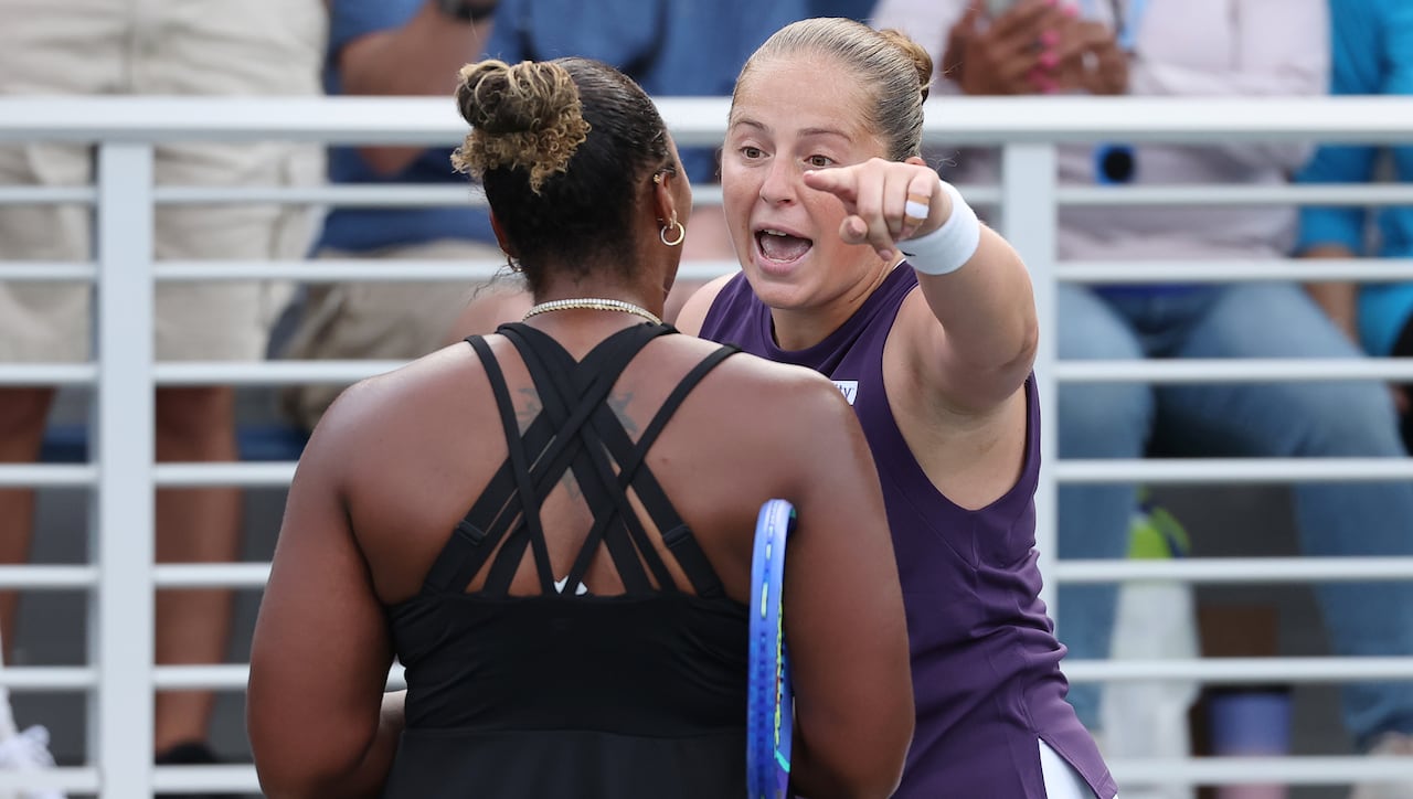 Two women tennis players reason  aft  their match.