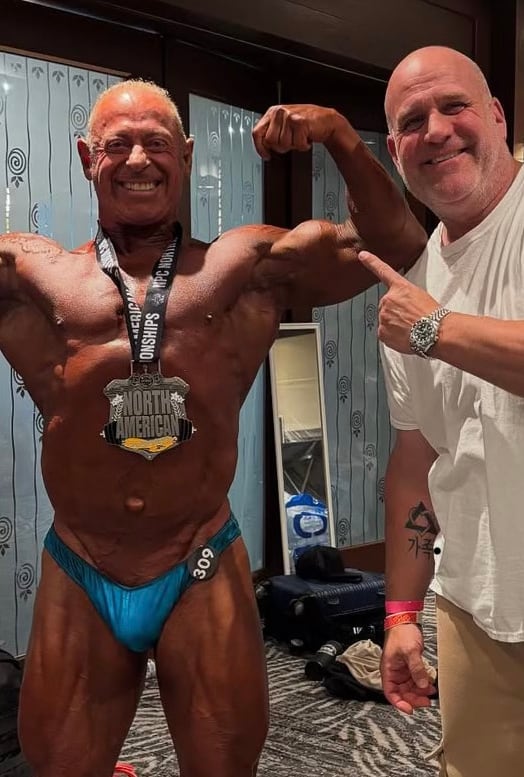 Bernie Mocker (left) with his coach, Tim Love (right) at the 2025 North American Championships, where Mockler won gold in his division.
