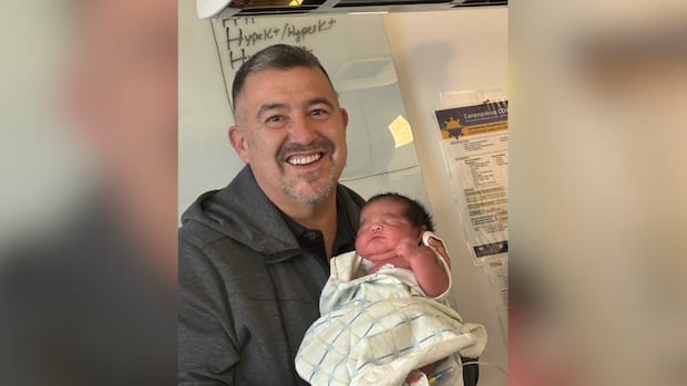 Dr. Don Wilson, a Heiltsuk obstetrician-gynecologist, delivered Anthony Bennett Johnson on Monday, Oct. 13, 2025 at ƛ̓uxválásu̓ilas Heiltsuk Hospital in Bella Bella, B.C. A man hold a newborn baby in a hospital room